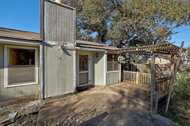 doorway to property with a patio