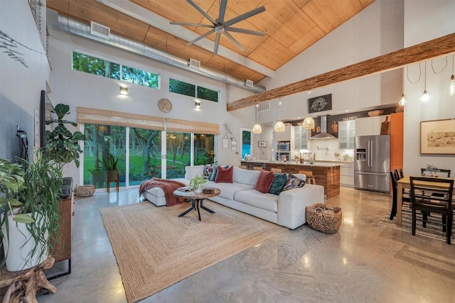 living room featuring concrete flooring, ceiling fan, high vaulted ceiling, and wooden ceiling