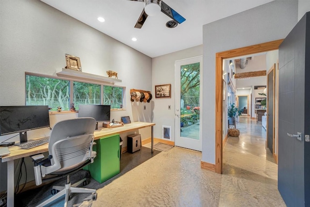 office space with ceiling fan and a healthy amount of sunlight