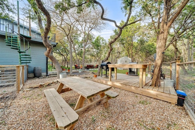 view of yard featuring a wooden deck