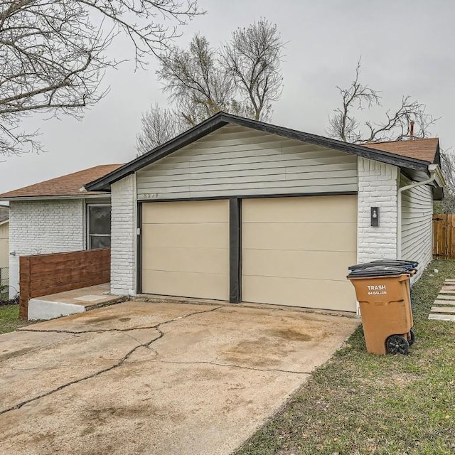 exterior space with a garage