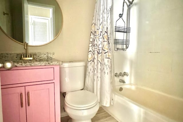 full bathroom featuring shower / bath combo, vanity, toilet, and wood-type flooring