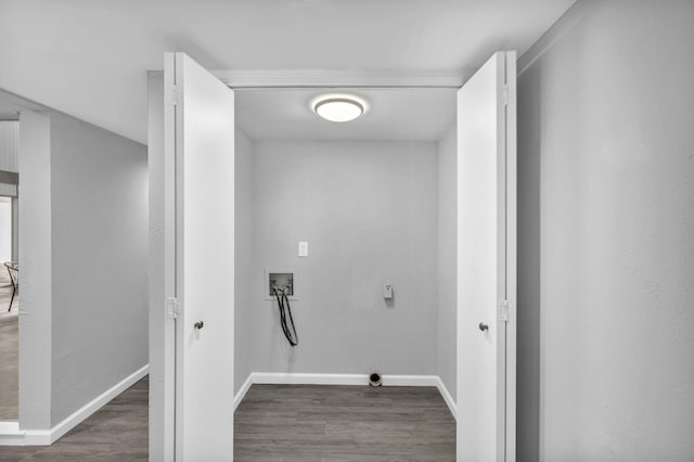 washroom featuring washer hookup and dark wood-type flooring