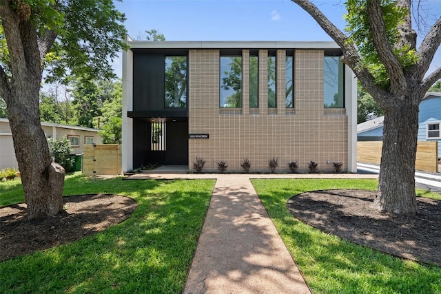 view of front of house with a front lawn