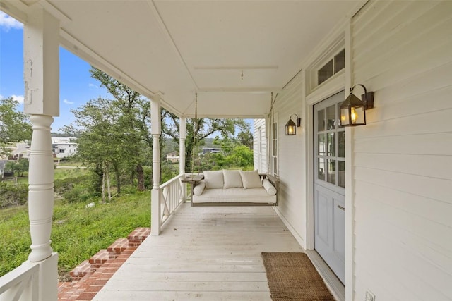 wooden deck with covered porch