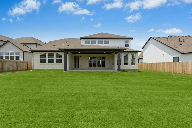 220 Reata Ridge Loop, Liberty Hill, TX 78642 - back of house with a patio and a shingled roof