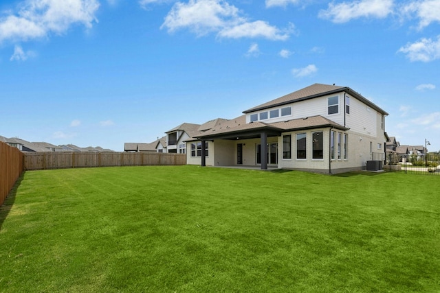 220 Reata Ridge Loop, Liberty Hill, TX 78642 - back of house featuring central AC and a shingled roof