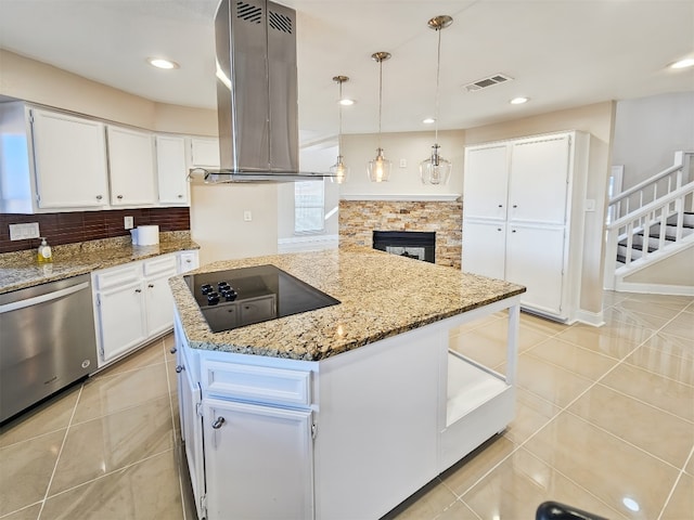 kitchen featuring white cabinetry, black electric cooktop, dishwasher, and island exhaust hood