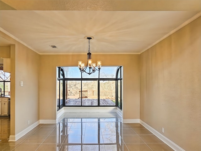 dining area featuring crown molding, tile patterned floors, sink, and a notable chandelier