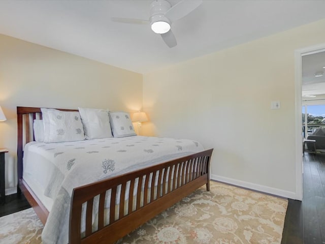 bedroom featuring wood-type flooring and ceiling fan