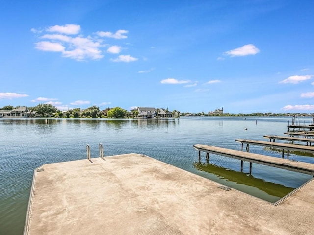 dock area featuring a water view