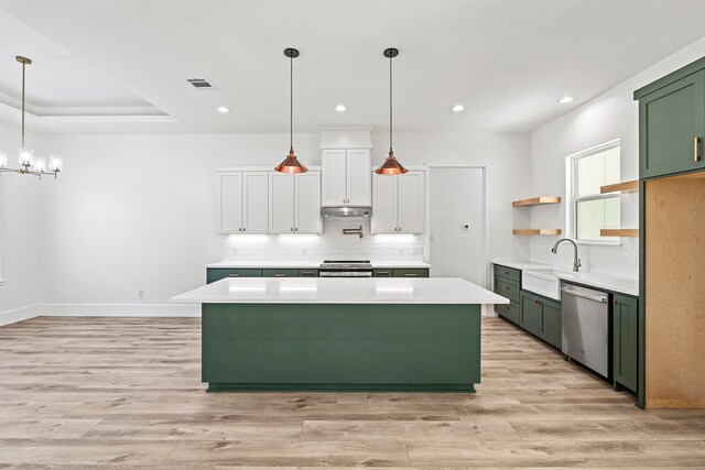 kitchen featuring white cabinetry, light hardwood / wood-style flooring, sink, and appliances with stainless steel finishes