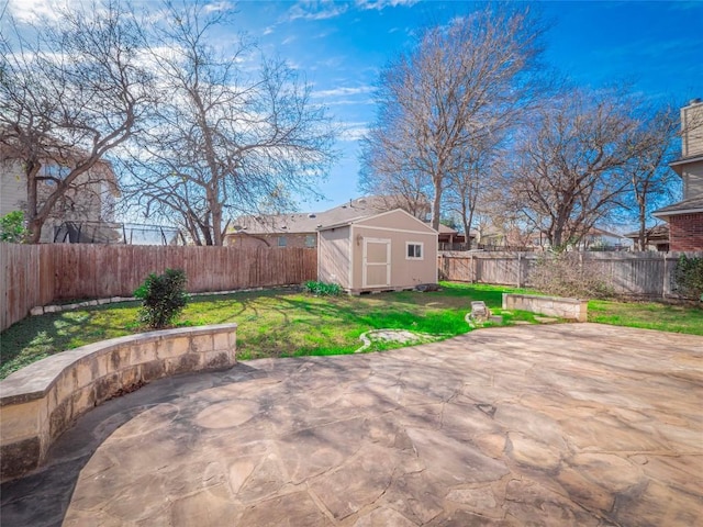 view of patio with a storage unit