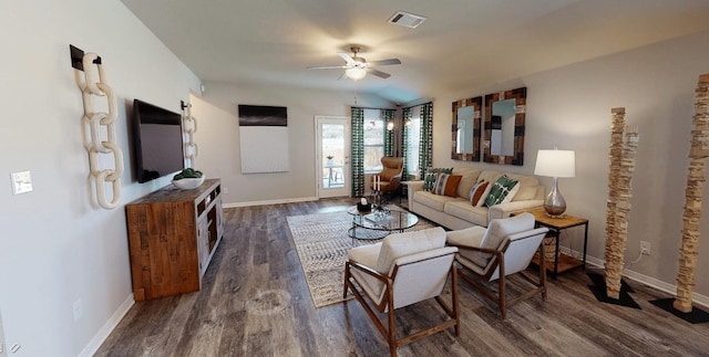 living room featuring ceiling fan, dark wood-type flooring, and vaulted ceiling