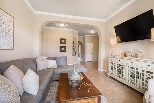 living room featuring ornamental molding and light tile patterned floors