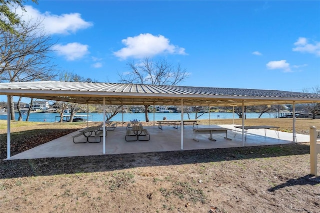 view of patio / terrace with a water view