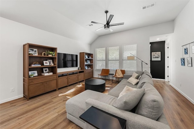 living room featuring light wood-type flooring, ceiling fan, and lofted ceiling