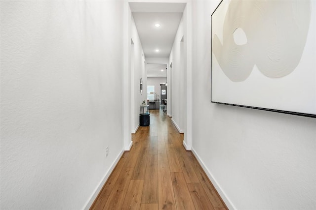 hall featuring hardwood / wood-style floors