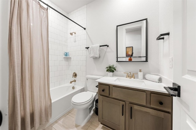 full bathroom featuring tile patterned floors, vanity, toilet, and shower / bath combo with shower curtain