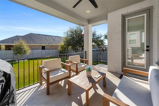 view of patio with an outdoor living space, ceiling fan, and a grill