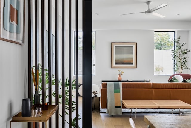 interior space featuring hardwood / wood-style floors and ceiling fan