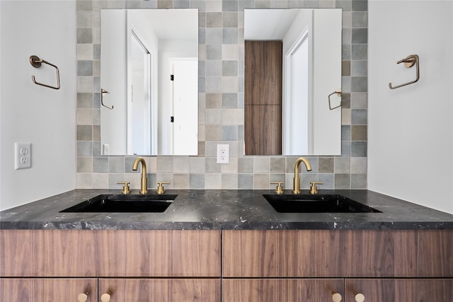 kitchen featuring backsplash and sink