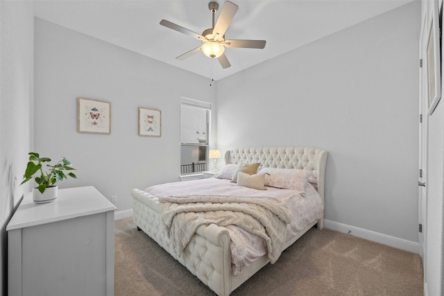 bedroom featuring carpet flooring, ceiling fan, and lofted ceiling