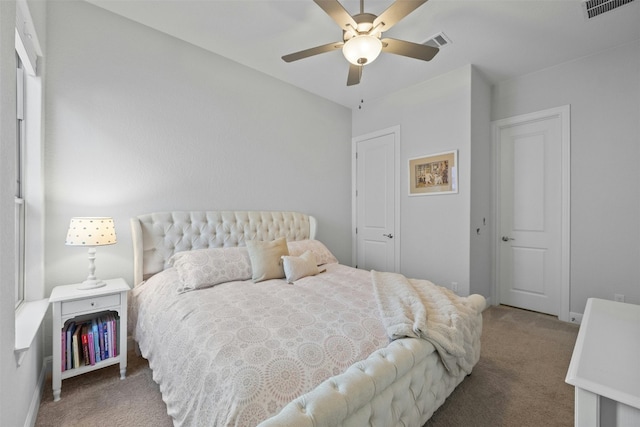 carpeted bedroom with ceiling fan