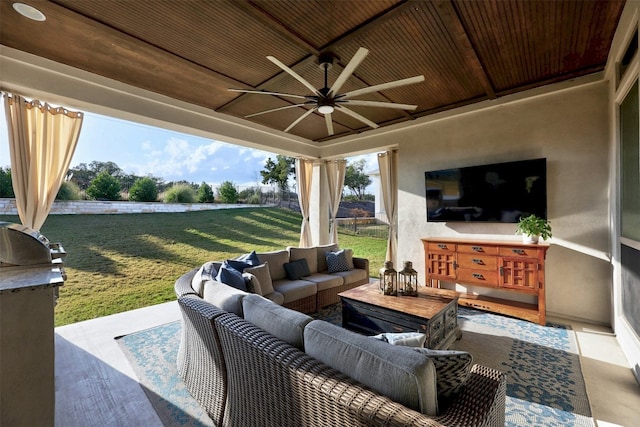 view of patio with ceiling fan and an outdoor hangout area