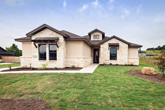 view of front of house with a front lawn