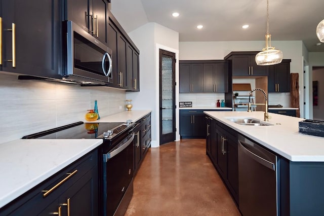 kitchen featuring backsplash, hanging light fixtures, sink, and appliances with stainless steel finishes