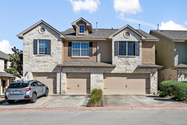 view of front of property with a garage