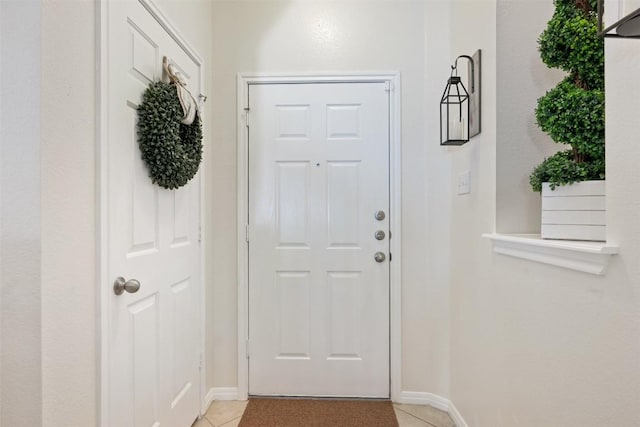 entryway featuring light tile patterned floors