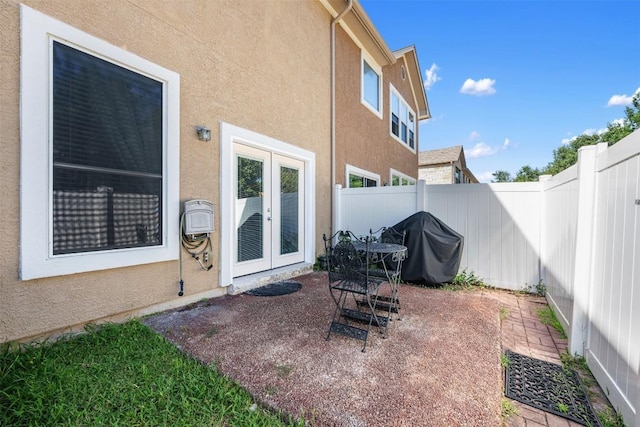 view of patio / terrace with grilling area and french doors