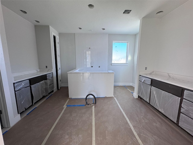 kitchen with a textured ceiling