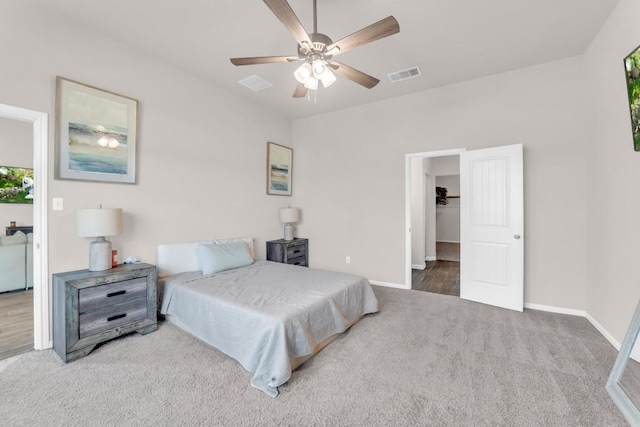 carpeted bedroom featuring ceiling fan