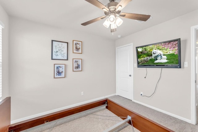 bedroom with ceiling fan and carpet