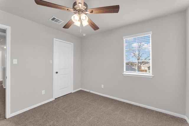 carpeted empty room with ceiling fan