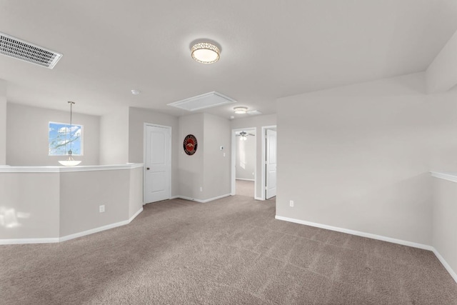 unfurnished room featuring carpet flooring