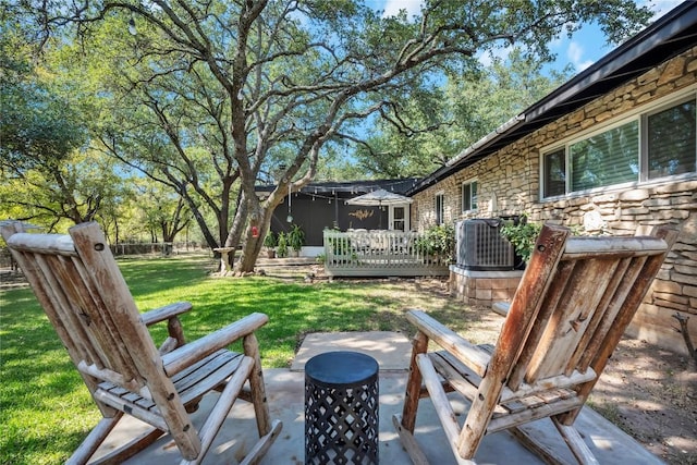 view of patio with central AC unit