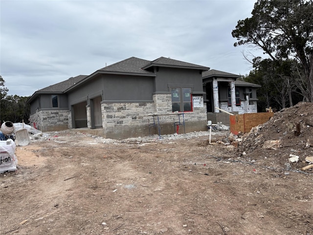 view of property exterior with a garage