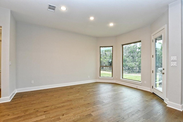 4616 Destination Way, Jonestown, TX 78645 - unfurnished room featuring wood finished floors and recessed lighting