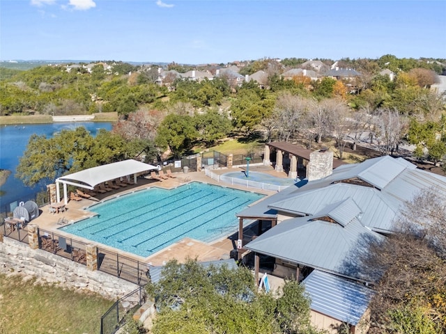 view of pool with a water view