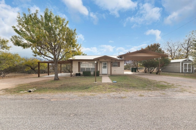 single story home with a carport