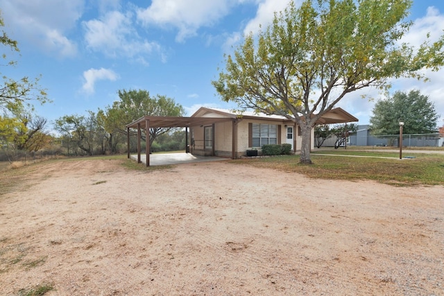 view of front of house with a carport