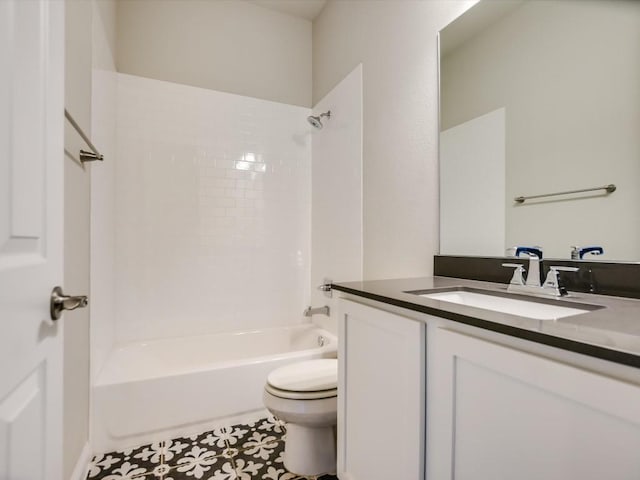 full bathroom with tile patterned flooring, vanity, toilet, and tiled shower / bath