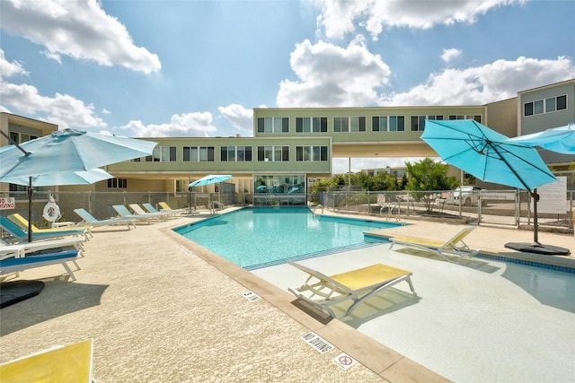 view of swimming pool featuring a patio