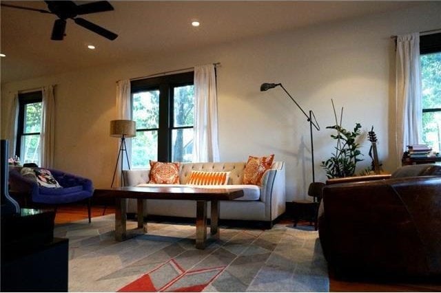 living room featuring ceiling fan