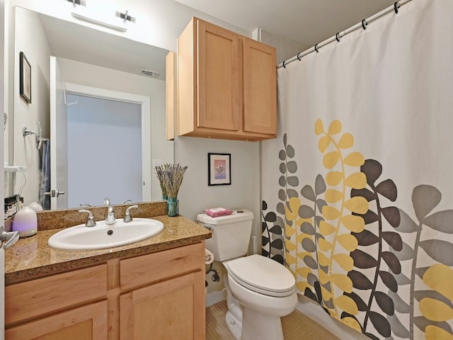 bathroom with tile patterned flooring, vanity, toilet, and a shower with shower curtain