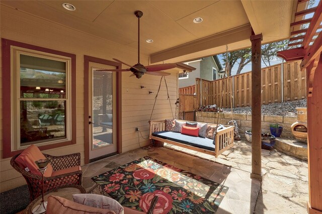 view of patio with ceiling fan